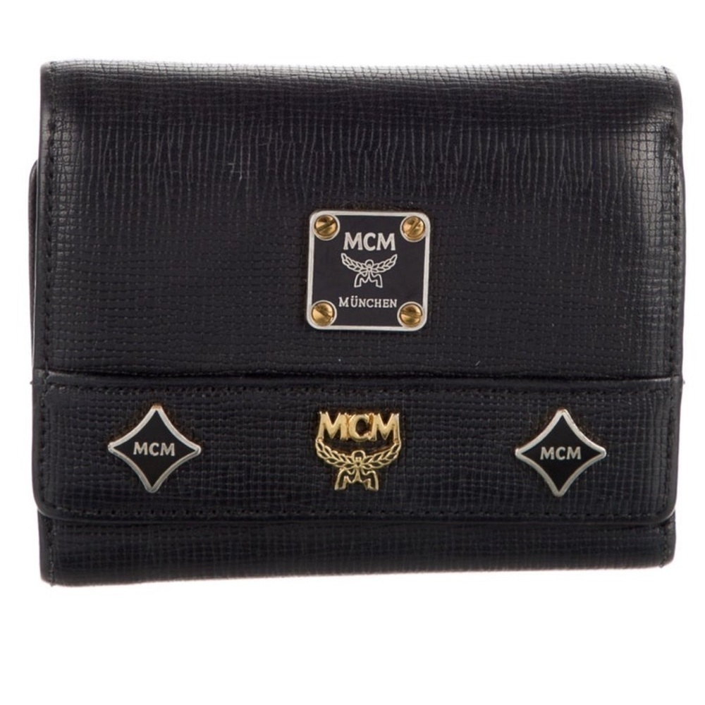 EUC MCM Wallet with charms still attached. Black Leather